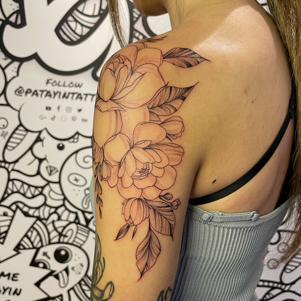 Fine line shoulder peony tattoo