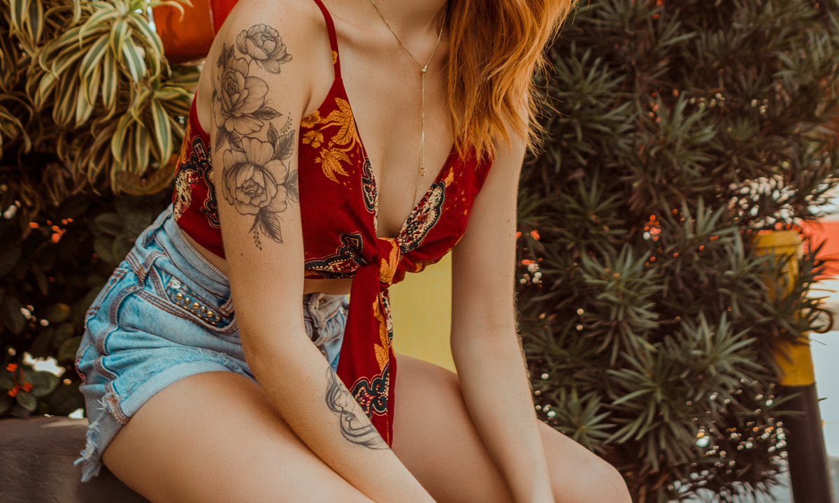 Floral tattoo on a beautiful girl.
