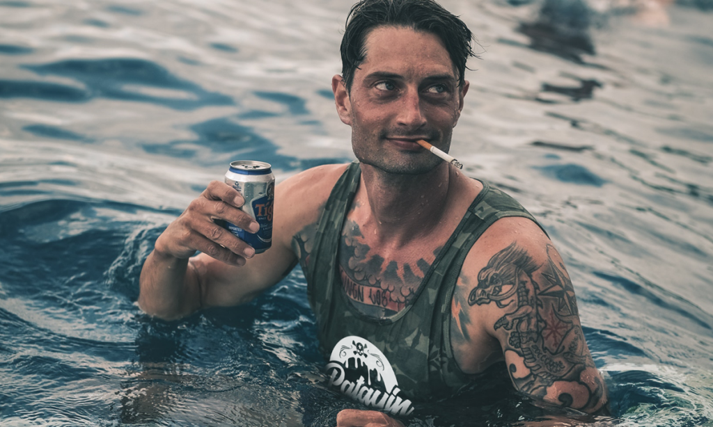 Smoking a cigarette in the pool.