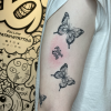 Butterflies and patayin logo tattoo