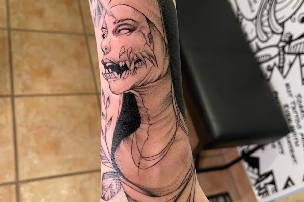 Demonic nun tattoo