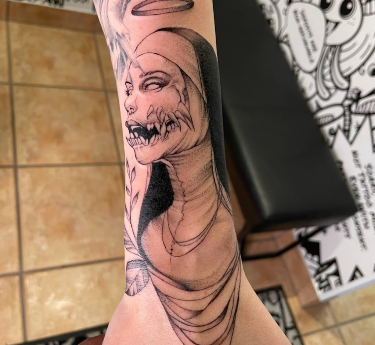 Demonic nun tattoo