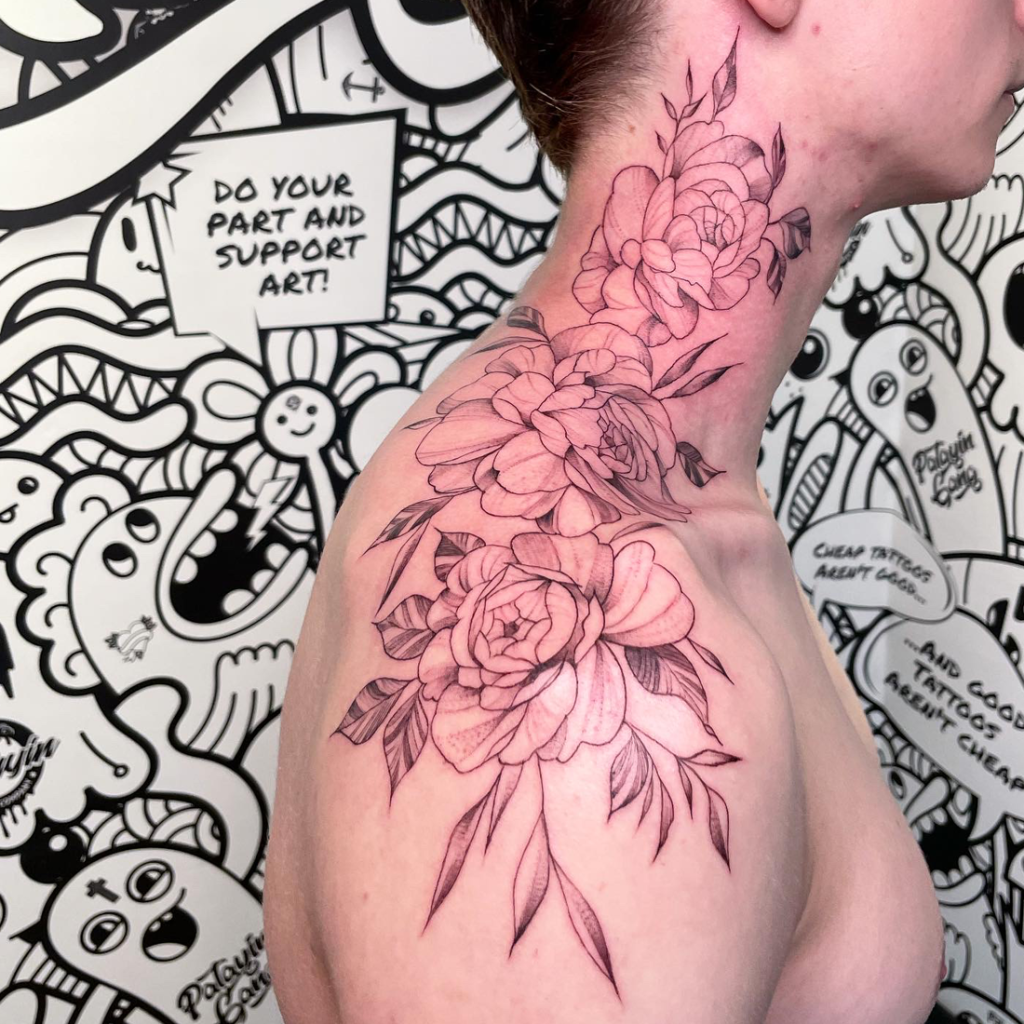 Shoulder and neck peony fine line tattoo for men.