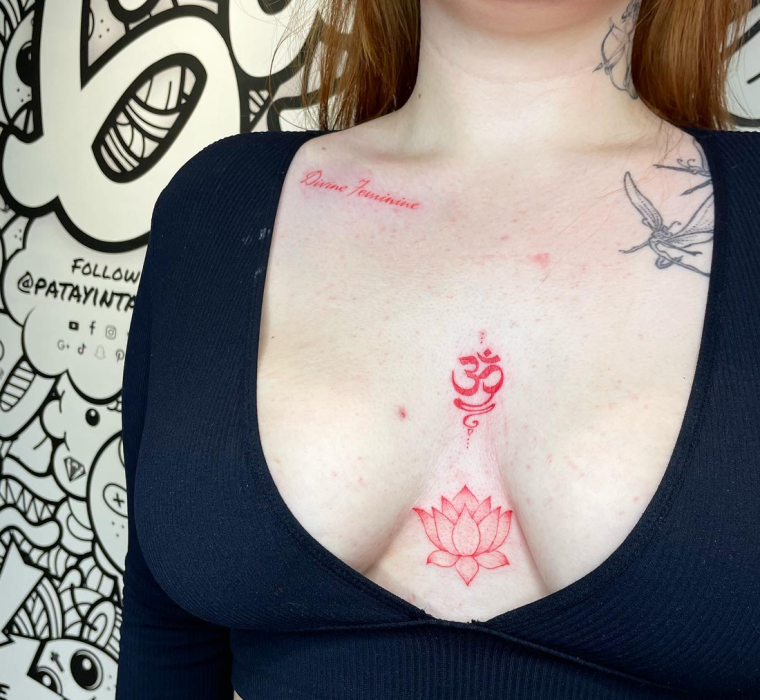 Red ink fine-line tattoo