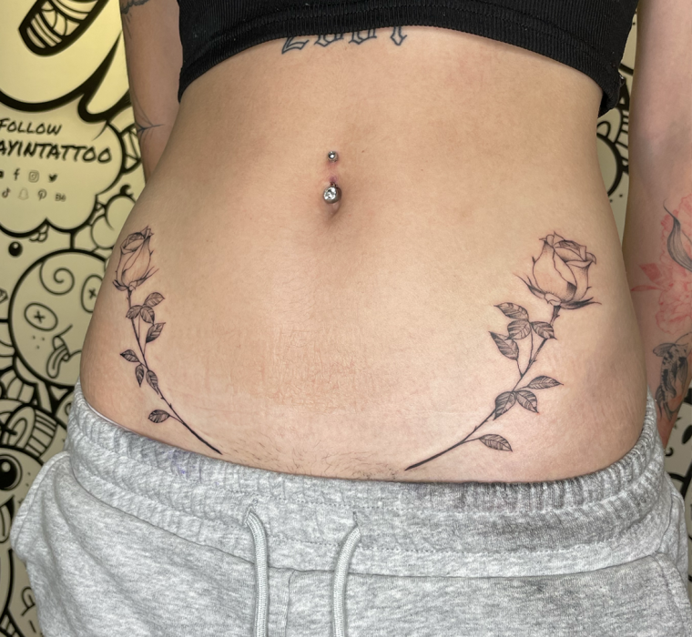 Fine line rose hip tattoos