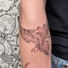 Spliced raven tattoo