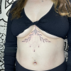 Under boob foliage and ornamental patterns.