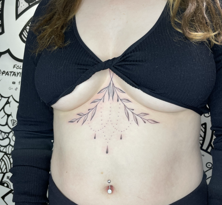 Under boob foliage and ornamental patterns.