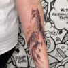 Abstract paintbrush phoenix tattoo by Dennis Garcia