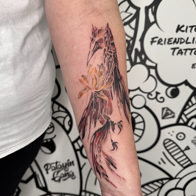 Abstract paintbrush phoenix tattoo by Dennis Garcia