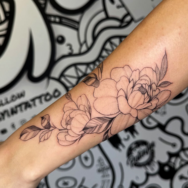 fine-line floral forearmtattoo