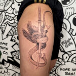fineline-snake-sword-crow-dennis-garcia-patayin fine-line sword and snake tattoo