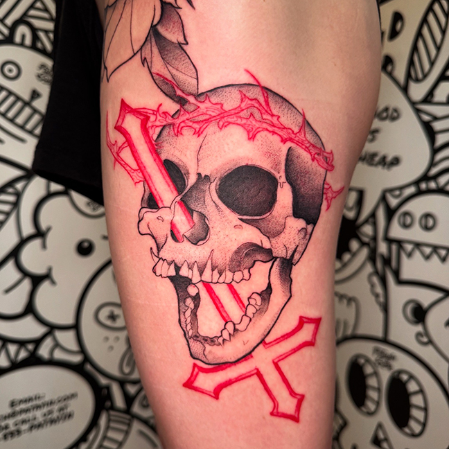 skull with inverted cross in black and red tattoo