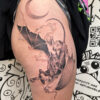 Black and grey flying horse tattoo