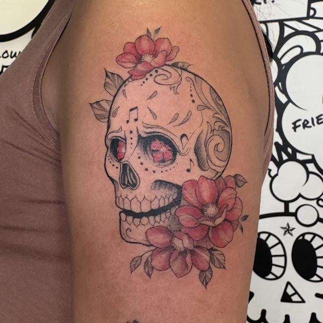 Fine-line skull and flowers in music theme style