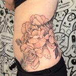 Tiger and floral large hip and back tattoo